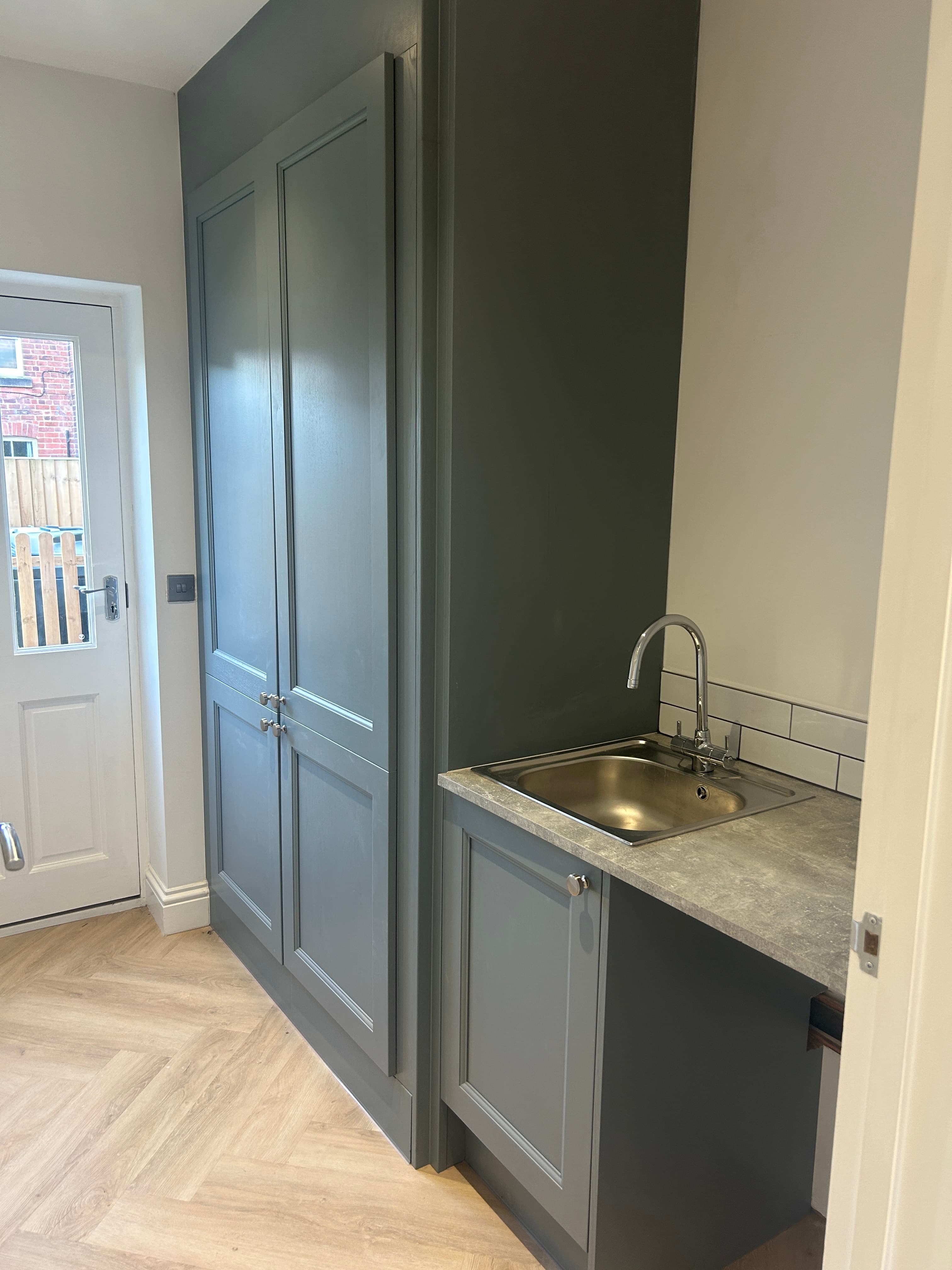 Kitchen worktop and window detail in a finished renovation